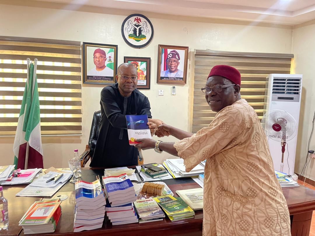 PROF. NJOKU DANIEL C DONATES BOOKS TO UAES 